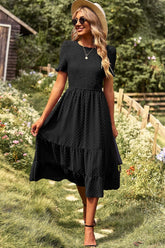 Robe mi-longue à pois smockés, col rond et manches courtes
